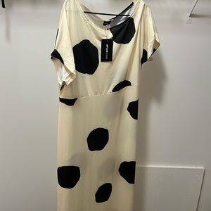 Long maxi cream dress with black polka dots